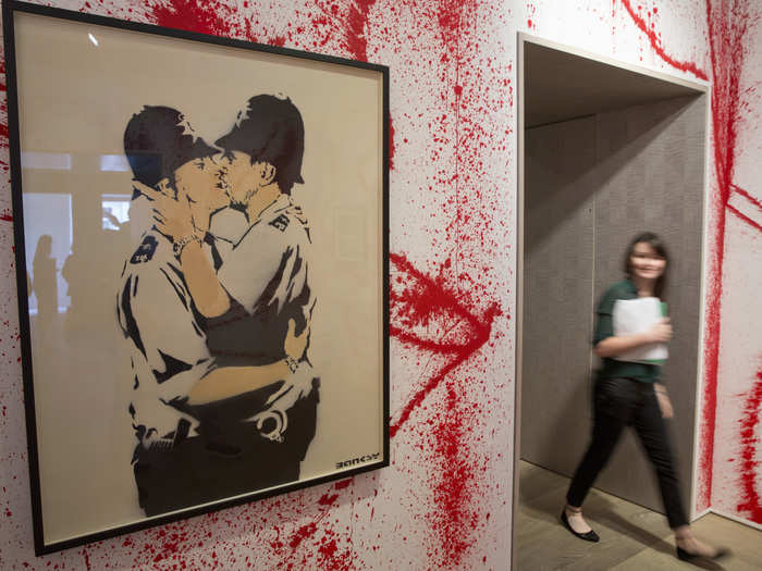 Even some of his most iconic street art pieces have made it into galleries, like this famous stencil of two English police officers in a loving embrace.