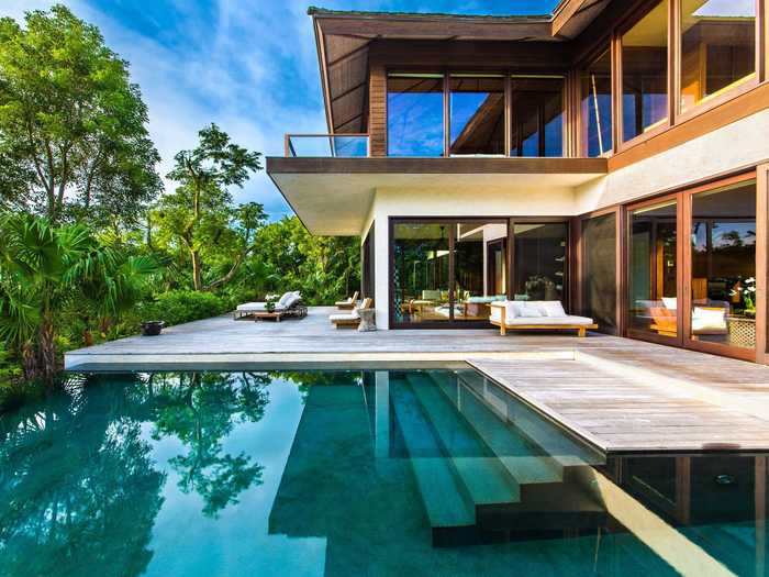 The infinity pools come up almost right next to the homes.