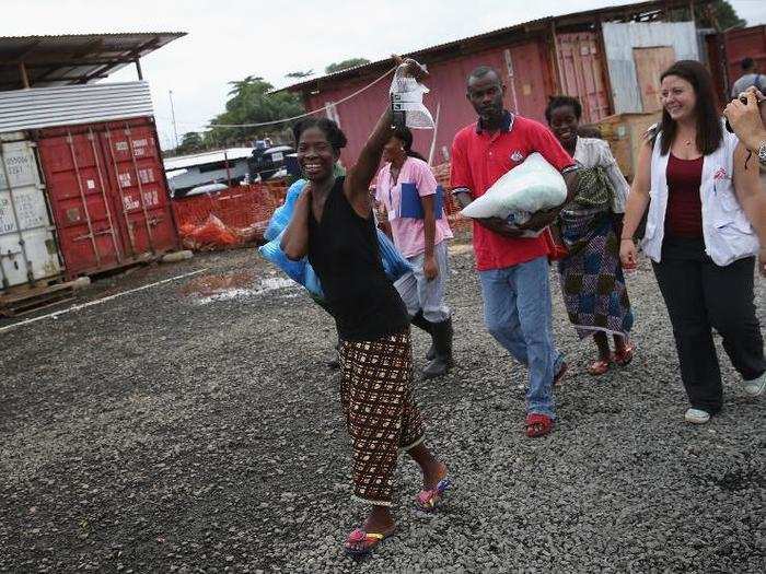 Sontay Massaley, 37, smiles as she leaves a MSF clinic in Paynesville, Liberia. She