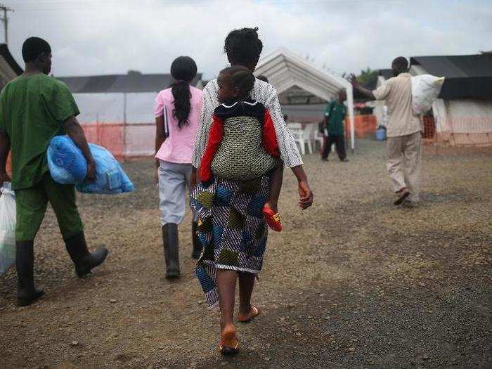 Survivors leave a MSF clinic to return to their lives in Liberia.