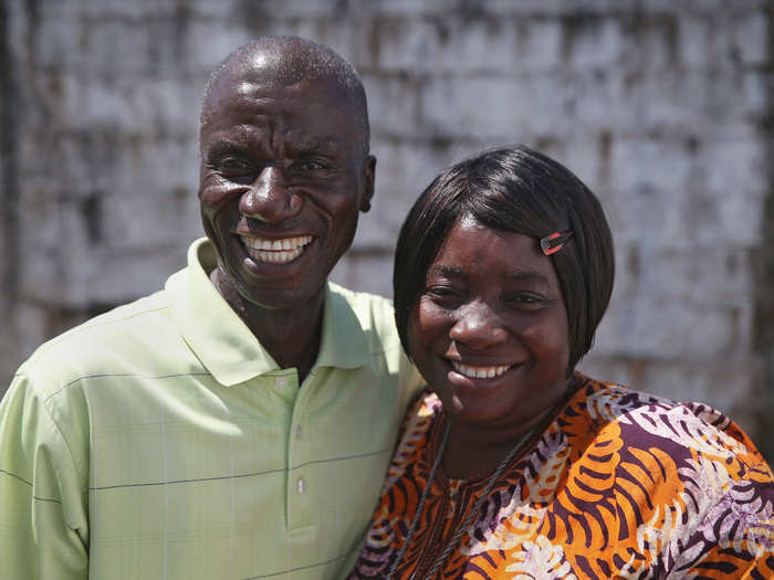 Ebola survivors Anthony Naileh, 46, and his wife Bendu Naileh, 34, prepare to leave a MSF clinic together. She is a nurse and got sick treating patients, and then passed the virus on to her husband. Happily, both lived.