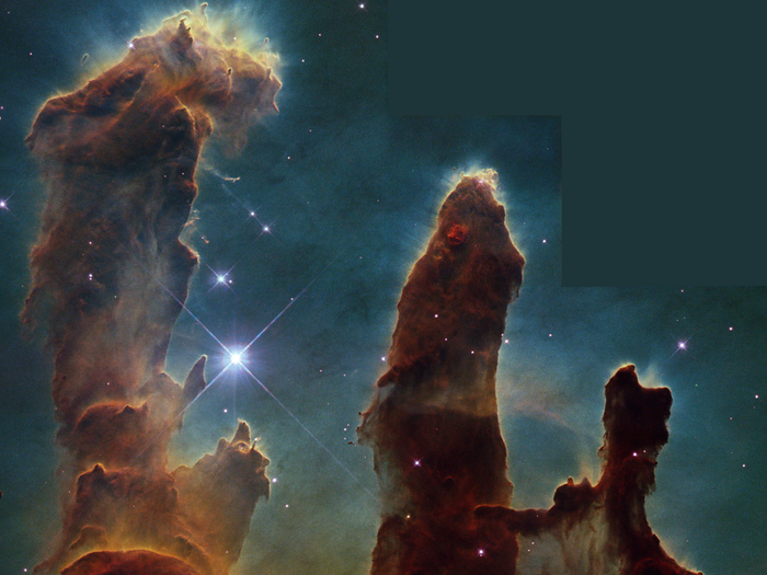 This Hubble image of the Eagle Nebula is a classic, but do you know where to look? Check out the top of the tallest pillar and you