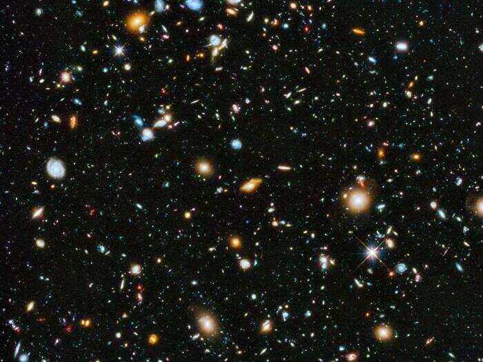 This is the famous Hubble Ultra-deep Field, released in June of 2014. It is one of the most detailed deep-space images ever taken, showing 10,000 galaxies. This image is helping scientists understand which objects were responsible for reionization, the process that made our universe transparent. Without reionization, the universe would be a foggy haze, and we could not study or see it the way we do today.