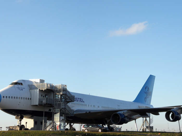 You enter the Jumbo Stay Hostel from the side, and yes, you can walk along the wings.