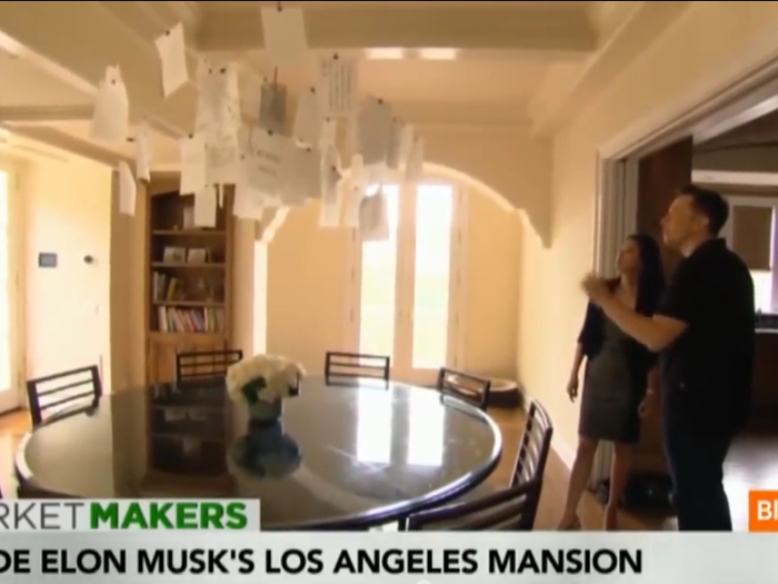 Musk added an interesting light fixture in the dining area.