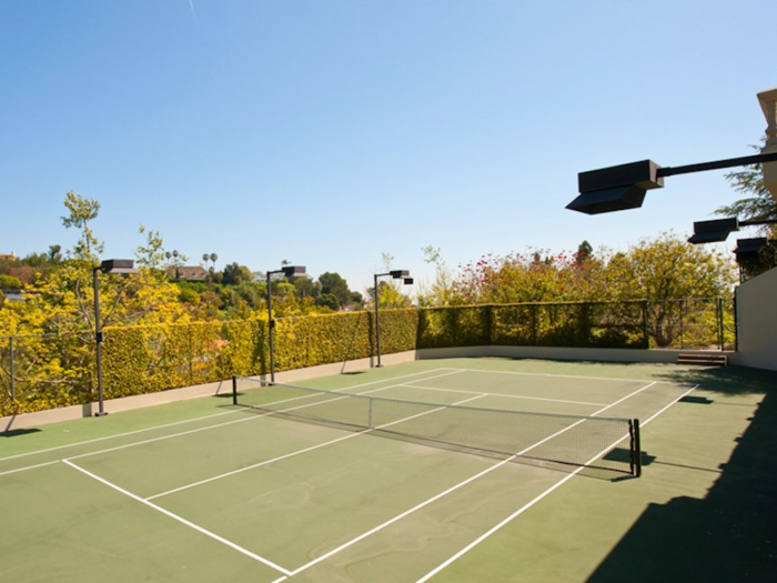 It overlooks the full-size tennis court.