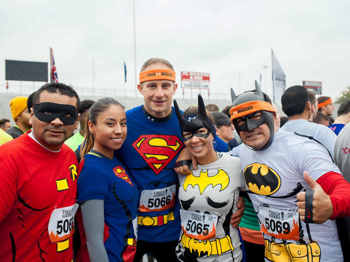 Prior to the start of the race, all the participants gathered in a mob before the starting area. Music blasted over the PA and an announcer tried to get people pumped up. We met more than a few teams that were dressed in costumes, like these superheroes.