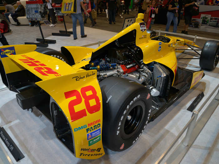 Race cars made an appearance, too. Honda showed off its Indy 500-winning race engine inside Ryan Hunter-Reay