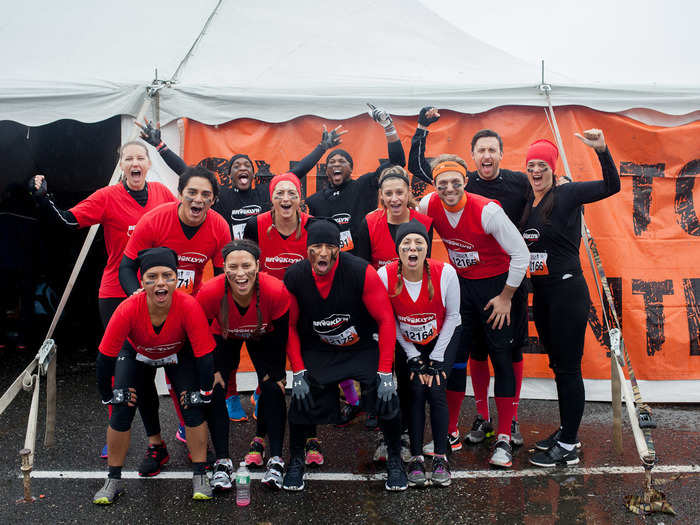 It ended up pouring. The team, however, was too pumped to care. Everyone on the team was a first-timer, except for Chris Belmore (right, with orange headband), who ran Tough Mudders at Mount Snow, Vermont (reputed to be the hardest Mudder) and Philadelphia.