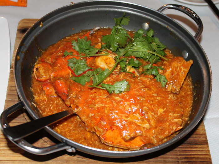 Sop up the spicy yet sweet gravy with a bun and crack into a pot of chili crab in Singapore.