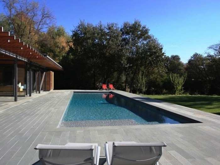 This pool deck would be a pleasant place to lounge in the sun.