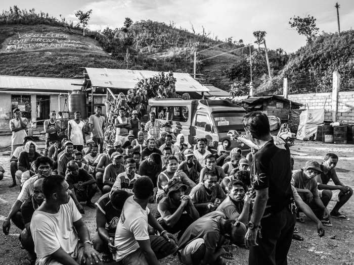 After Typhoon Haiyan hit, prison officials allowed many inmates to leave the prison to check on their families. Many found their families okay, but their houses destroyed.