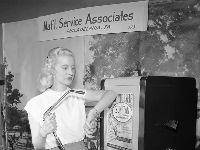 Unique vending machines are not a new thing, though. Here we see Model Betty Dutter in 1949, using a spray nozzle attached to a vending machine which dispenses sun tan lotion. For 30 seconds of spraying, it cost a dime.