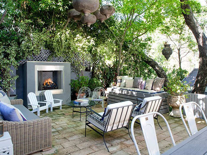 An outdoor fireplace would make for a fun gathering.