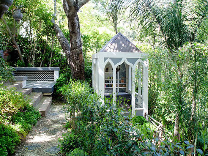 A series of steps lead down to this gazebo-like structure.