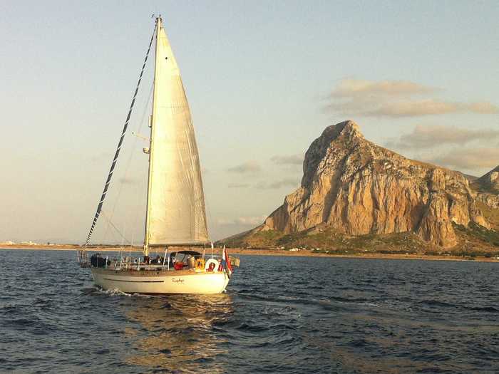 Plan a romantic getaway on this sailboat in Italy.