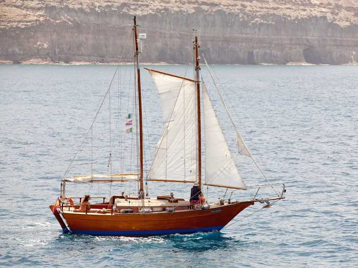 Cruise the Canary Islands on this mahogany and teak sailboat.