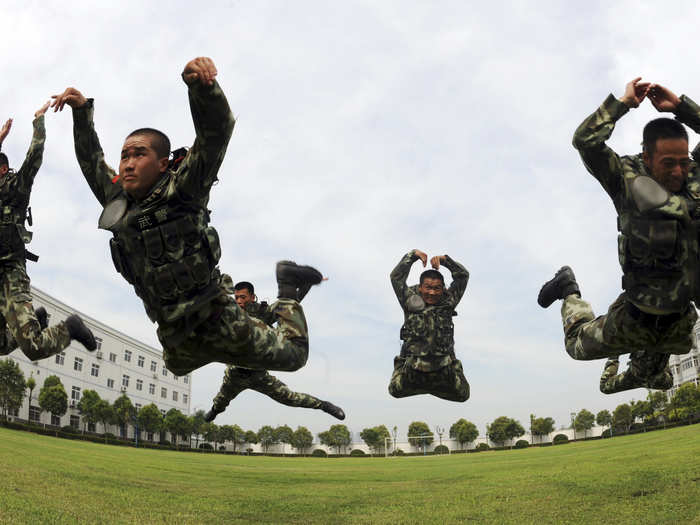 Trainees practice crazy synchronized jumps ...