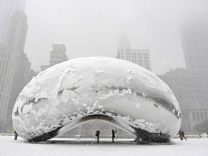 Stare at your reflection in Cloud Gate," a giant bean-like sculpture in Chicago