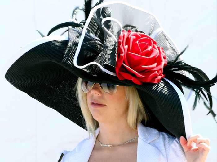 Don a big hat at the Kentucky Derby in Louisville, Kentucky.