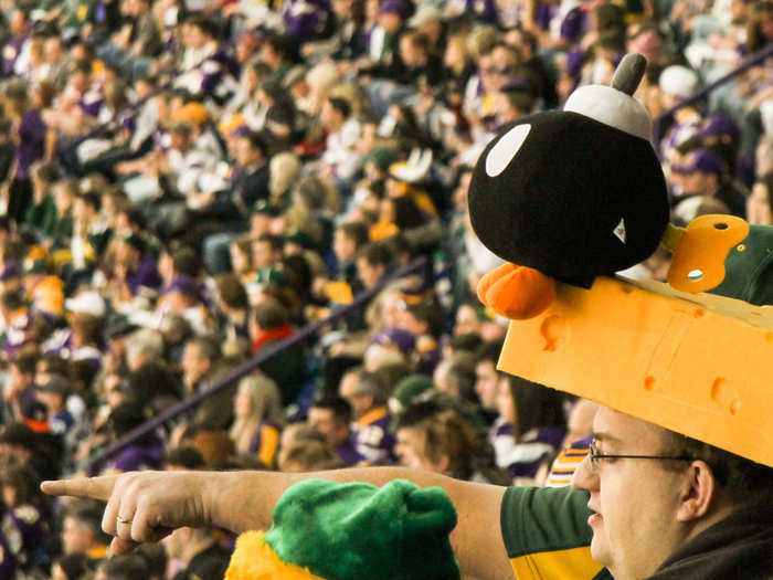 Bundle up and sport a cheesehead hat at a Green Bay Packers game in Wisconsin.