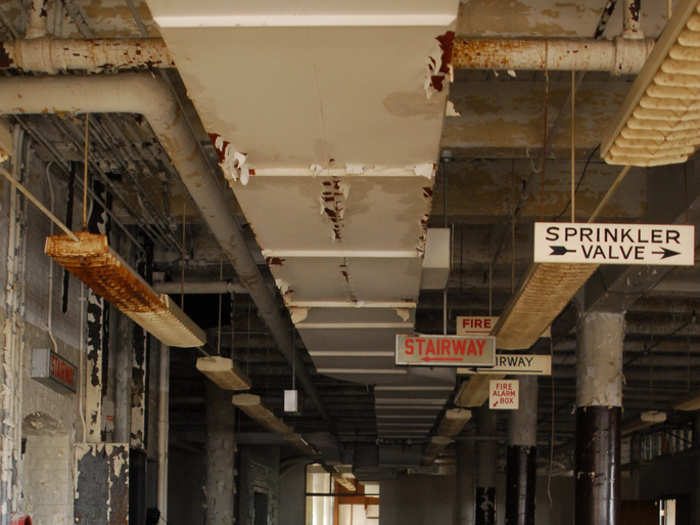 The old fluorescent lights are rusted over.