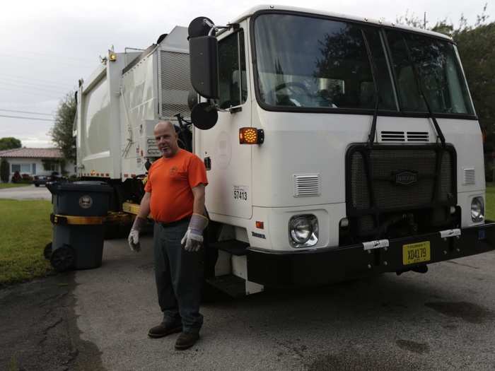 Pedro Brea, 50, now works as a municipal garbage collector in Miami. Brea said he spent three days clinging to a sinking raft in the middle of a storm when a U.S. Navy frigate picked him up from the sea.