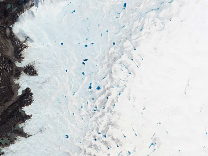 In spring, blue ponds speckle southwest Greenland as ice melts. The size and number of these ponds help track how much the ice sheet is melting each year.