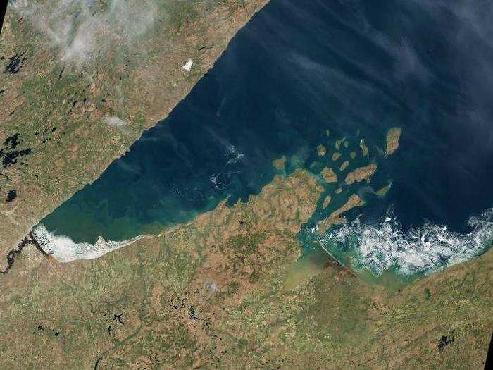 Beautiful swirls of ice decorate the edge of Lake Superior. Parts of the lake remained frozen as late as May of this year, when this image was taken of the region near Chequamegon Bay, Wisconsin.