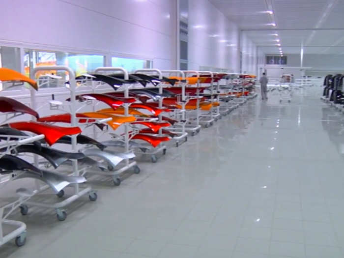 Body panels looks like parts of the rainbow, ready to be applied to a waiting car.