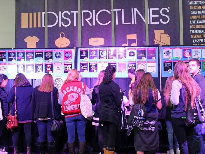 There were tables where fans could grab some YouTube star merchandise.