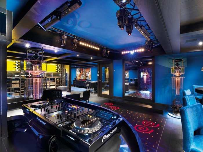 It even has a nightclub with a DJ booth, dance floor, and lighting.