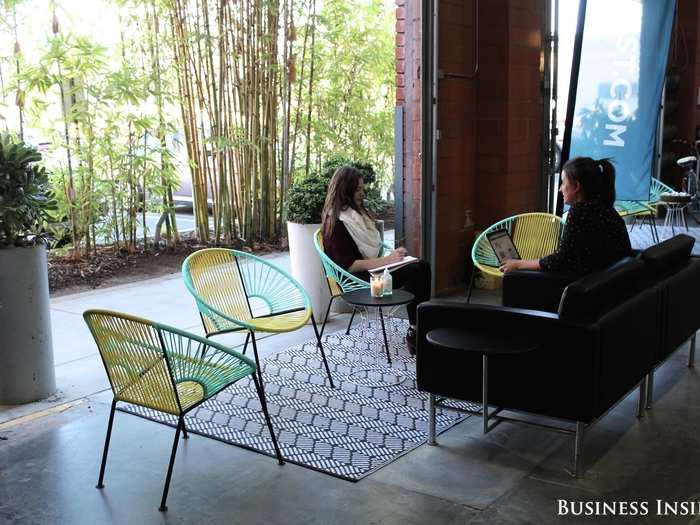 Garage doors open the workspace to the outdoors.