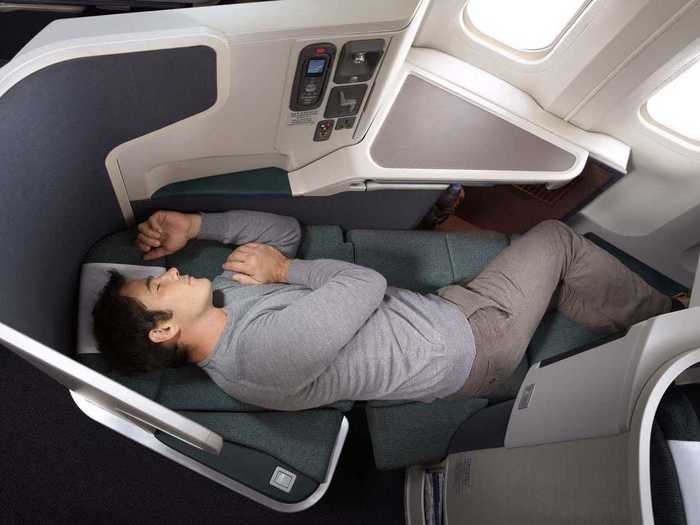 Every seat converts into a fully flat bed, with extra knee space for those who prefer to sleep on their side.