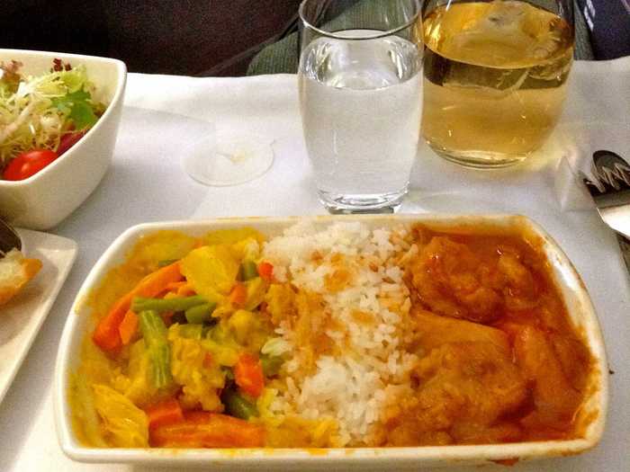 Other meals might include chicken, rice, and vegetables in a curry sauce, with wine to wash it down—in a real glass.