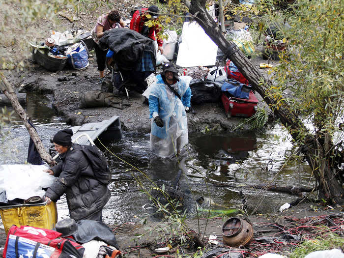 Others are seen crossing the severely polluted Coyote Creek.