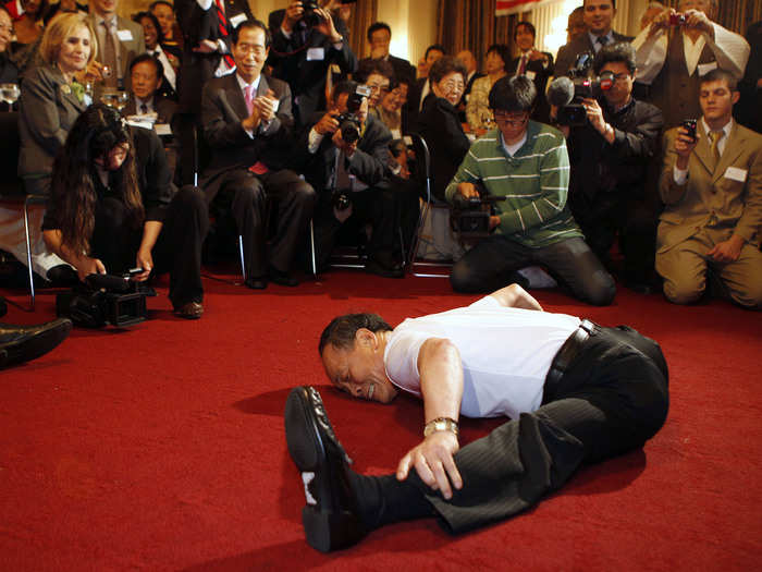 Grand Master Jhoon Rhee celebrates his 80th birthday by demonstrating his flexibility for the U.S. Congressional Taekwondo Club in the House Cannon Office Building Caucus Room on Capitol Hill, September, 2010.