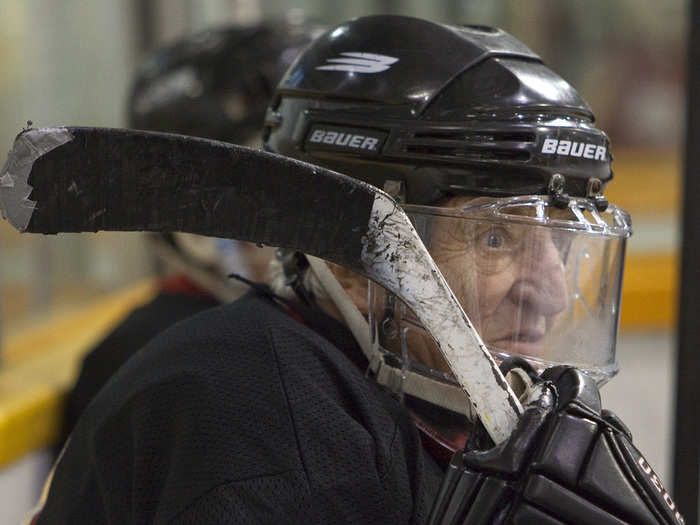 Don Fleming, 82, sits on the bench while taking part in a geriatric hockey tournament in Burnaby, British Columbia, in 2009. Players from the US and Canada gathered to play in the three-day tournament involving those 75 years and older.