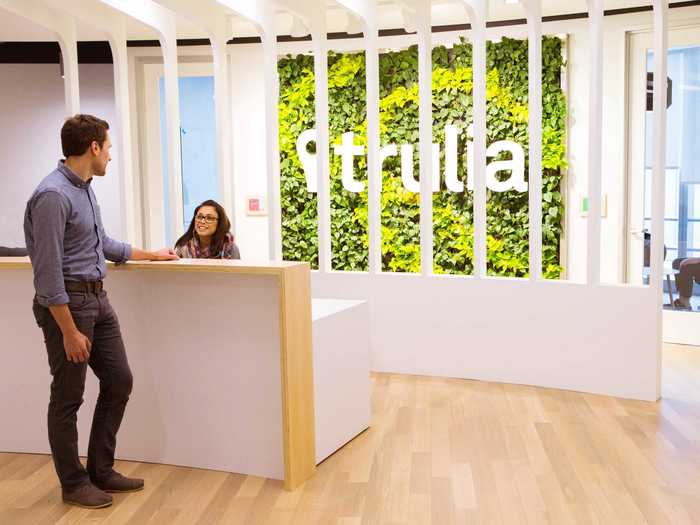 When you enter the office, a plant wall behind the reception desk might be the first thing you notice.
