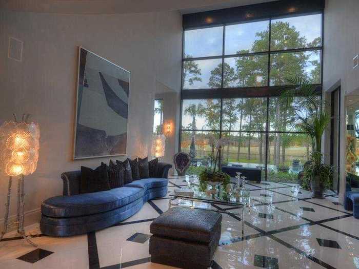 The home is covered in 25-foot, floor-to-ceiling glass walls.