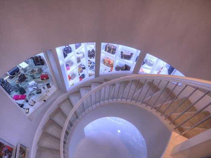 That has a spiral staircase running through the three levels. The first floor is reserved for her jewelry and over 60 Hermès Birkin handbags.