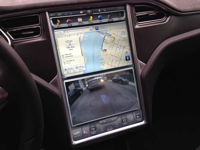 This is the now-famous center console touchscreen. It controls everything in the car, from the A/C and heat to the infotainment to the navigation system and the external cameras. Takes a few minutes to get used to, but otherwise, it