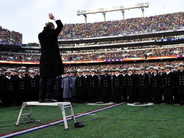 Members from the Army-Navy combined Glee Clubs perform the National Anthem together prior to the game. This is just one of the traditions that make this rivalry unique; while they