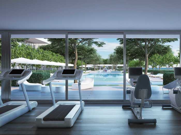 The gym will have a wonderful view of the pool and the Koons sculpture.