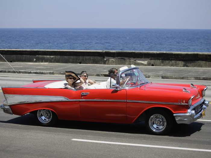 This 1957 Chevy Bel-Air convertible looks to be in good condition as takes a sea-side drive.