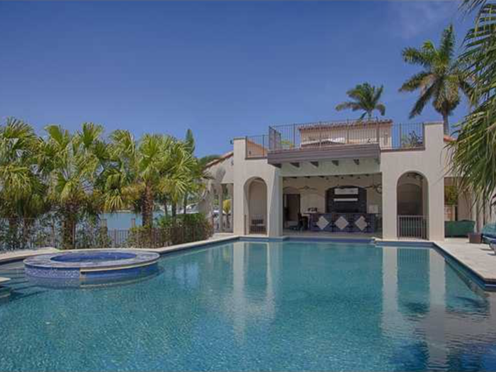 It also has a gorgeous pool and hot tub in the backyard overlooking Biscayne Bay.