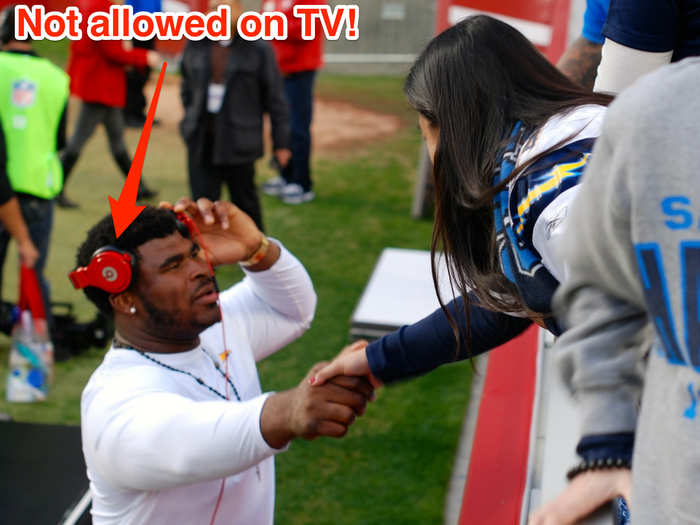 The NFL has a deal with Bose, but all the players we saw were wearing Beats headphones.