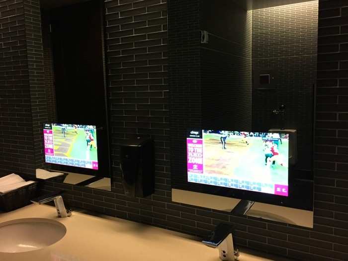 There are even TVs in the bathroom!