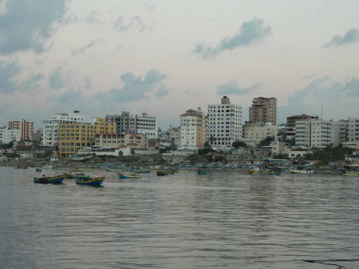 From the end of the pier at the Gaza port, the city looks like a tranquil, normal place. With its coastal access and proximity to the Suez Canal and Israel