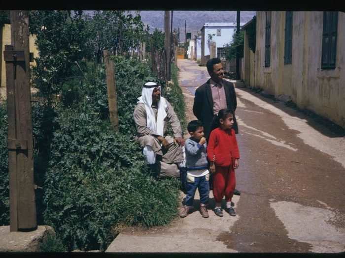 Below, a group travels along the small town road between Beirut and Damascus.